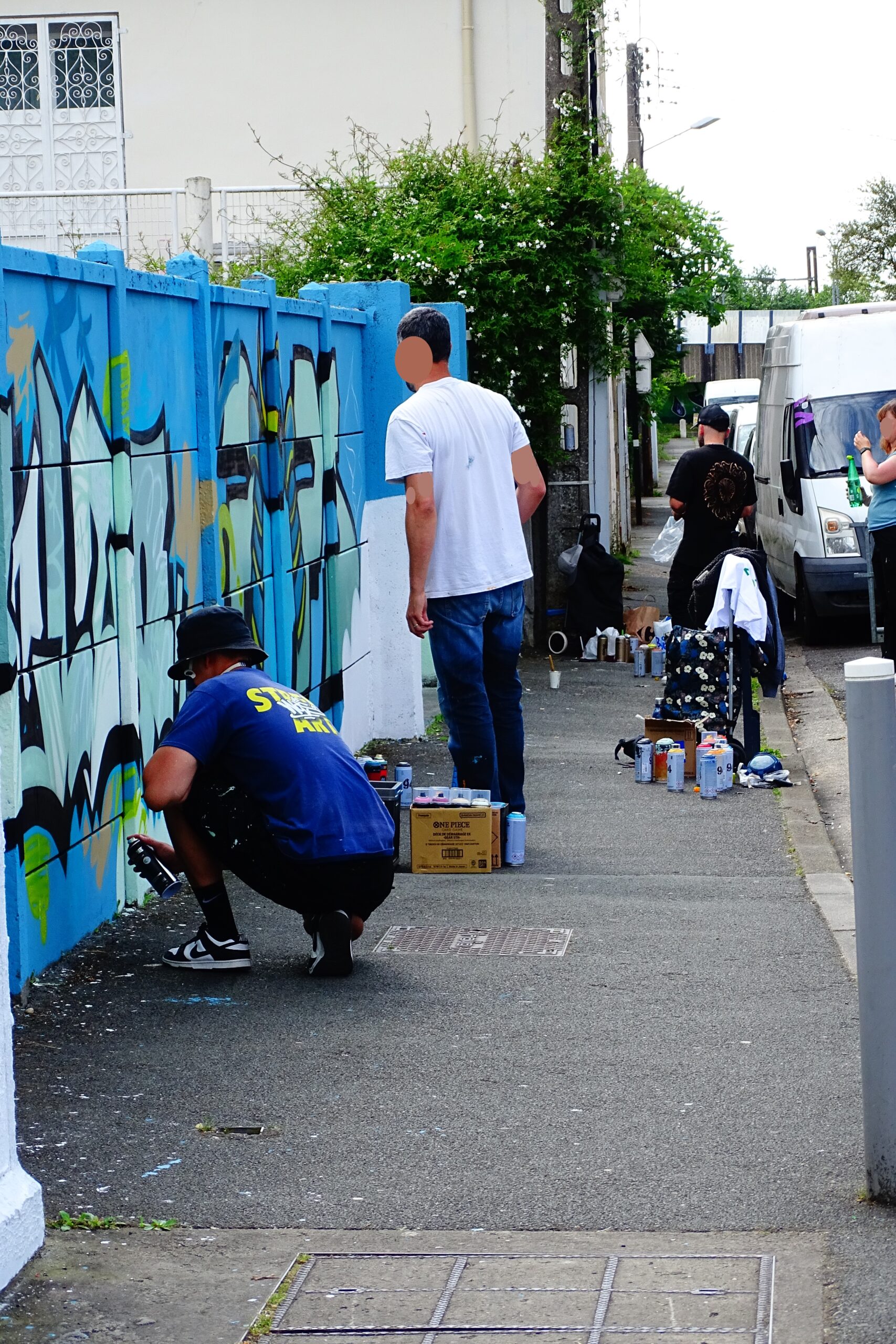 Artistes MEL20 Pops et Relik travaillant ensemble sur fresque street art