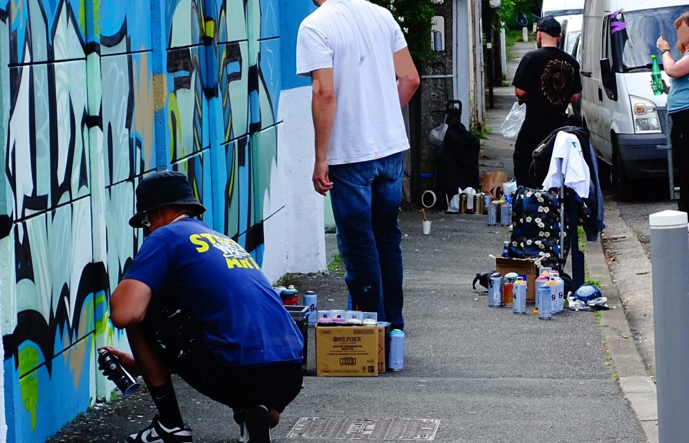 Artistes MEL20 Pops et Relik travaillant ensemble sur fresque street art